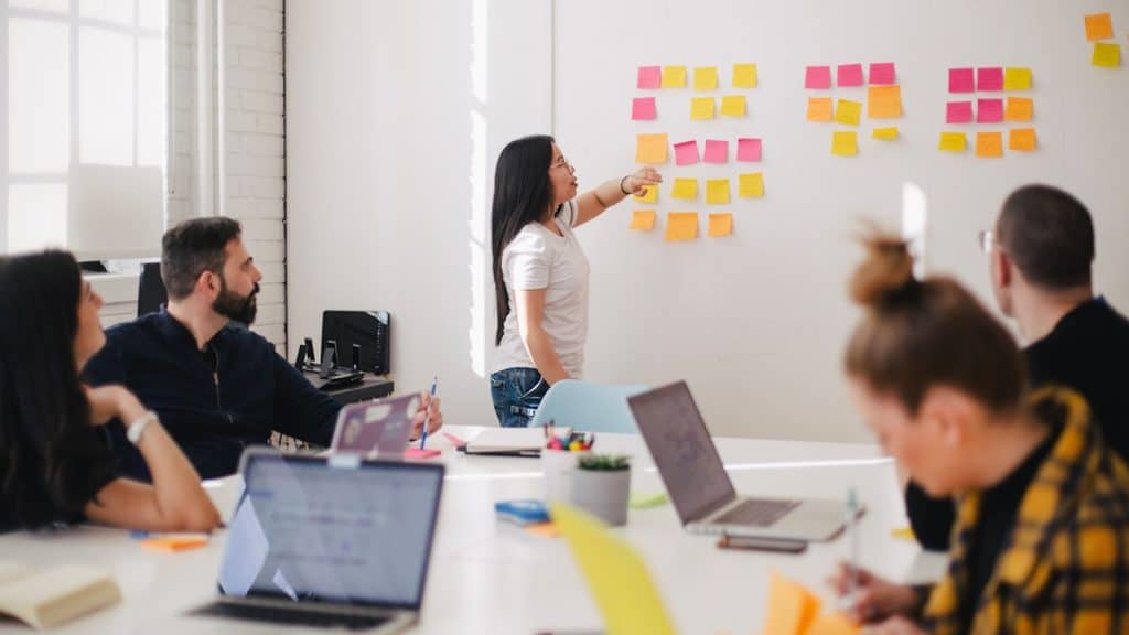 Small business team on a conference call in meeting room