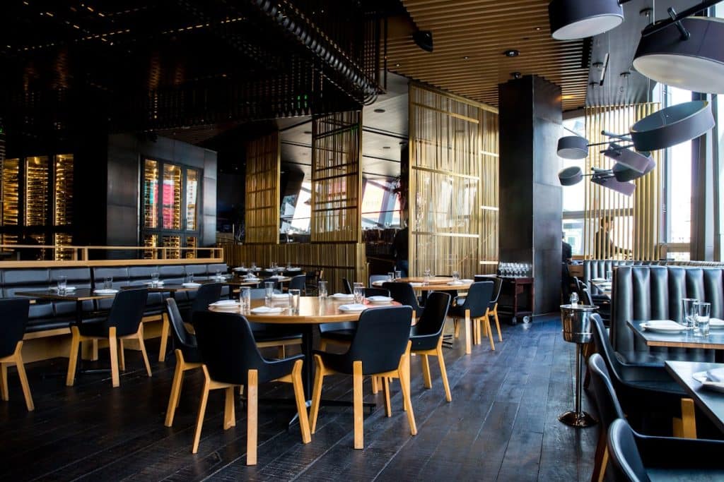 Restaurant interior with host stand phone system for reservations and takeout