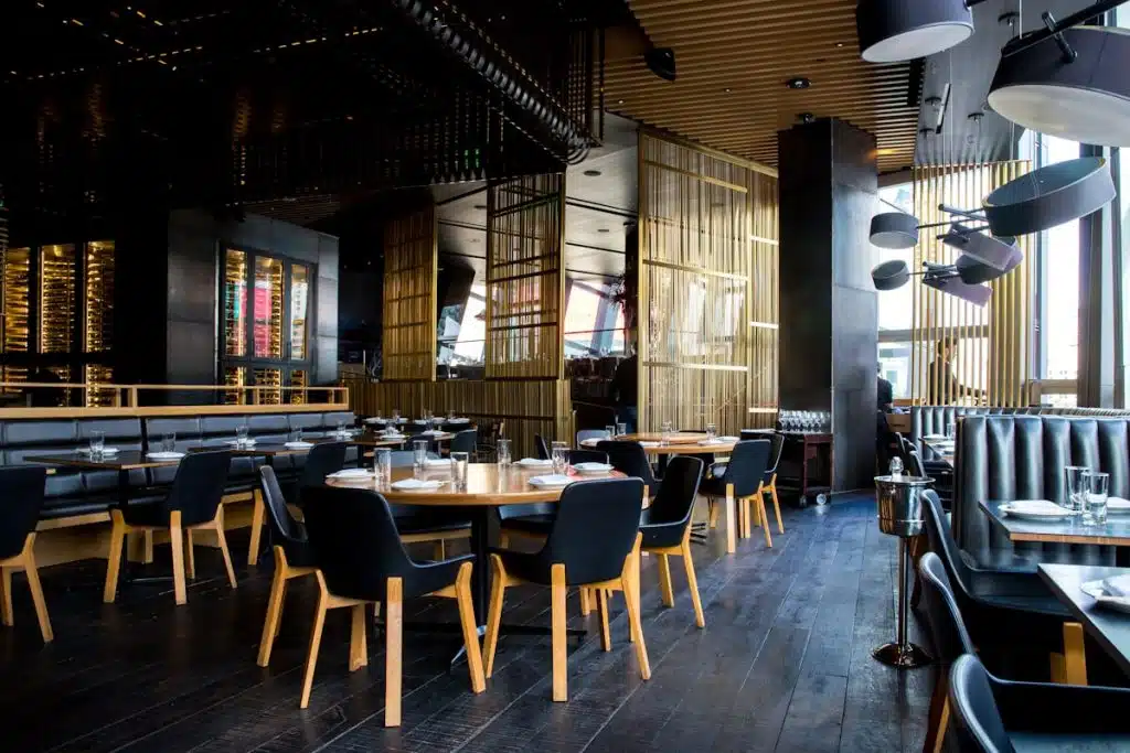 Restaurant interior with host stand phone system for reservations and takeout